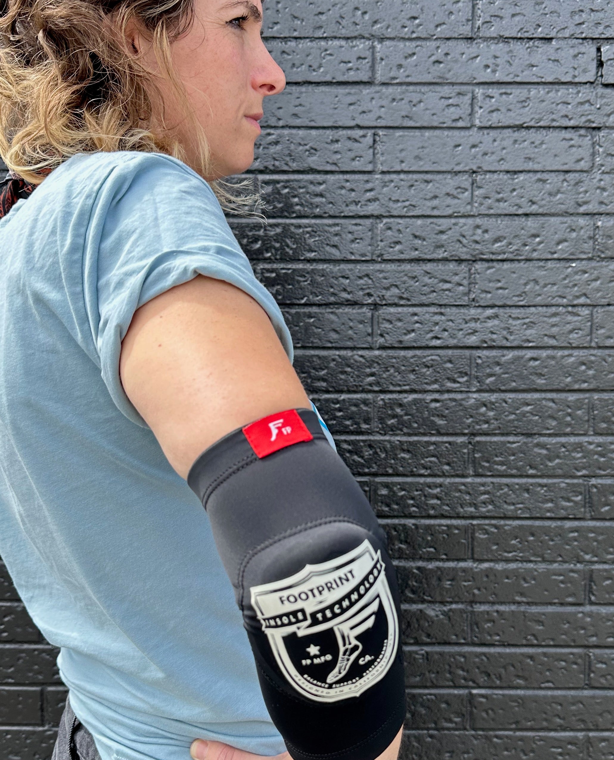 Front view of FP Low profile elbow pad fits under clothing