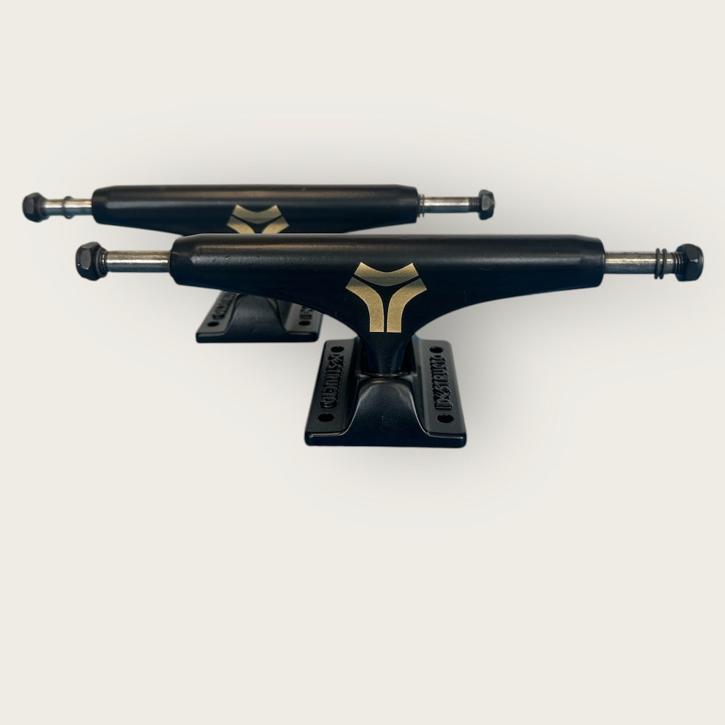 Destructo skateboard trucks D1 Mid Gold on black colourway.
