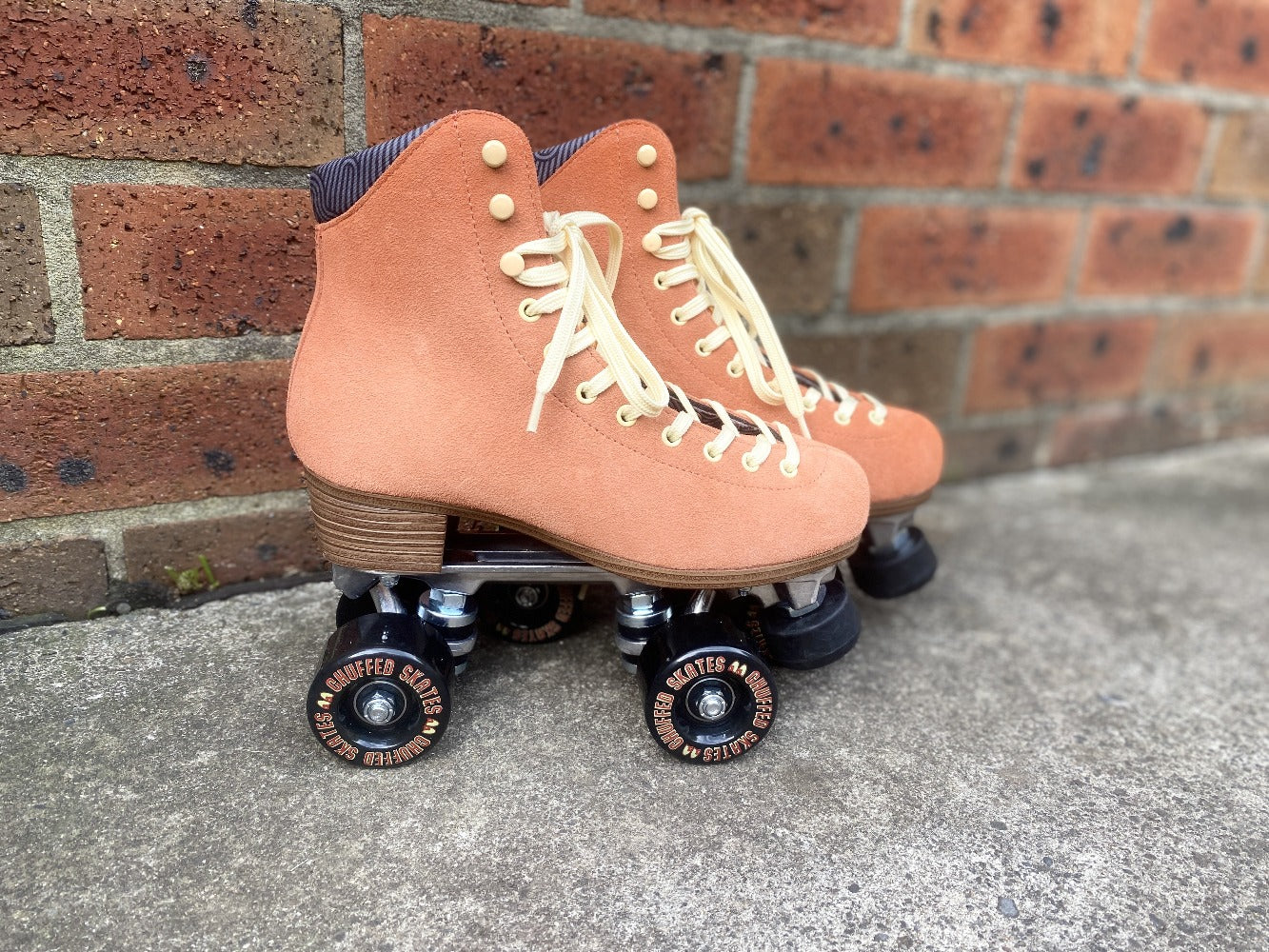 Chuffed wanderer roller skate in peach pink. 