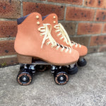 Chuffed wanderer roller skate in peach pink. 