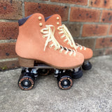 Chuffed wanderer roller skate in peach pink. 